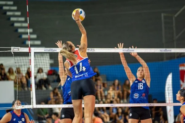 indoor volleyball match action